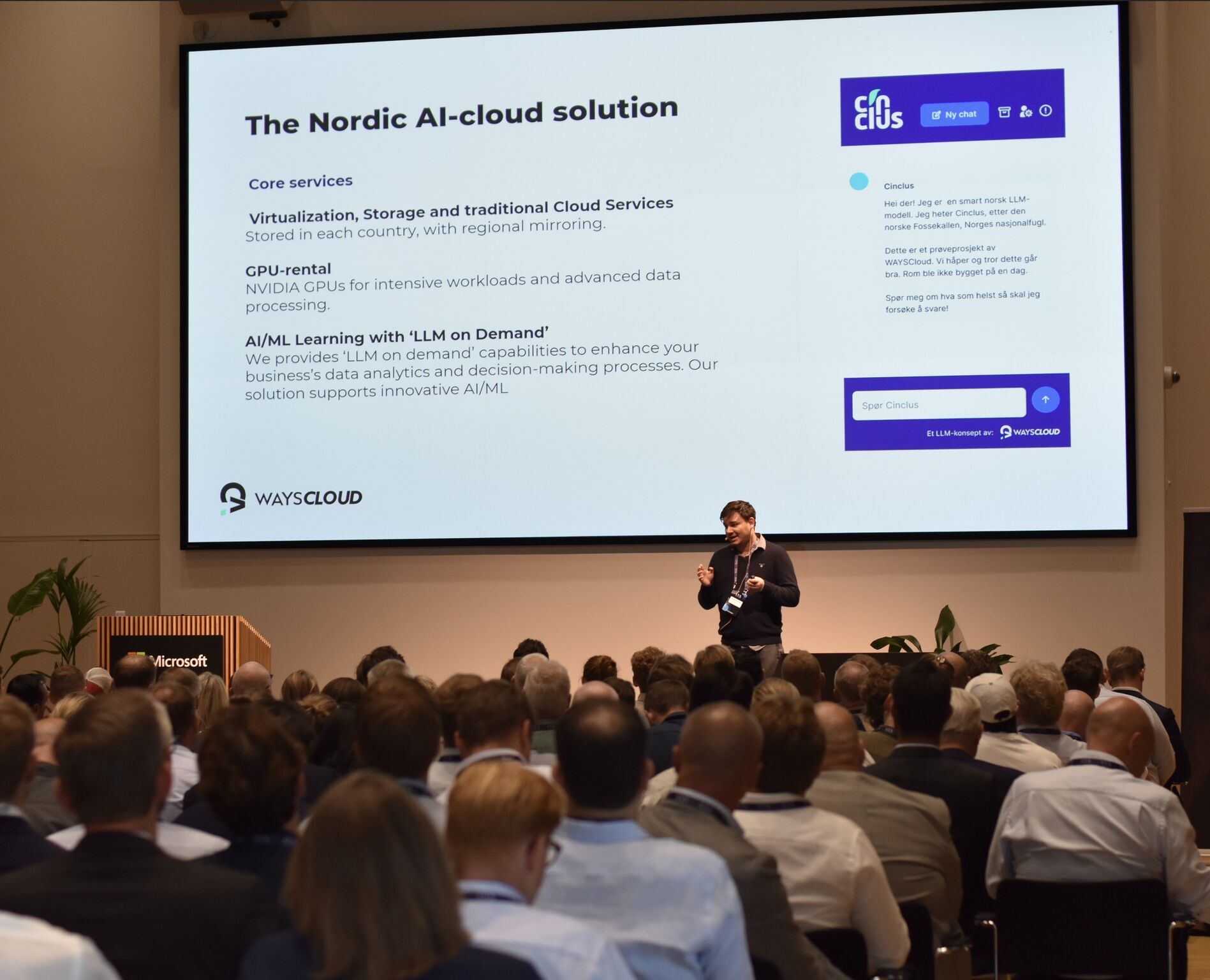 Speaker presenting digital sovereignty and cloud infrastructure on stage at Microsoft in Denmark