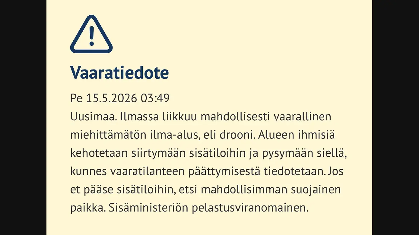 Screenshot of Finland's official emergency notification (vaaratiedote) warning of a possible drone over Uusimaa region, 15 May 2026.